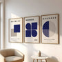 navy and beige bauhaus poster set arranged as modern gallery wall