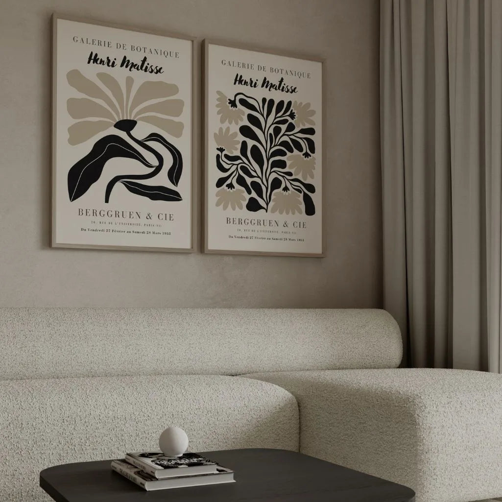 Set of 2 black and beige flower posters styled in modern living room