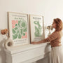Set of 2 botanical green posters arranged as gallery wall in bright modern interior