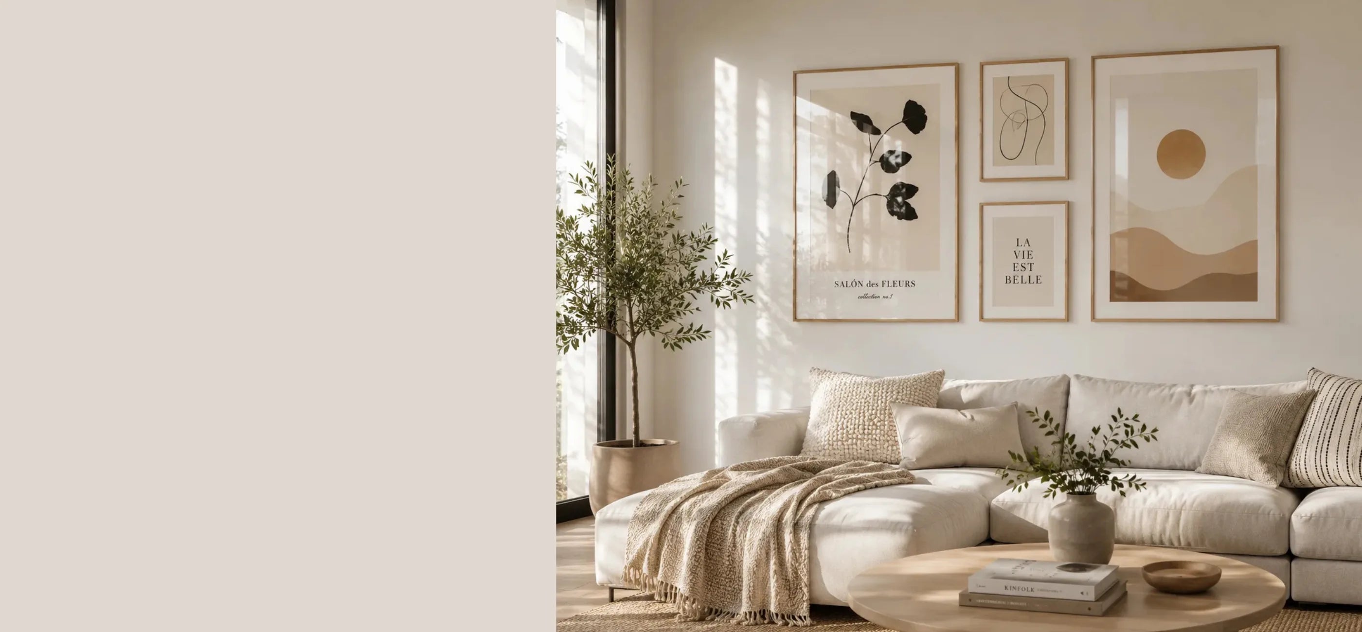 Modern gallery wall with framed posters above a beige sofa in a bright Scandinavian living room