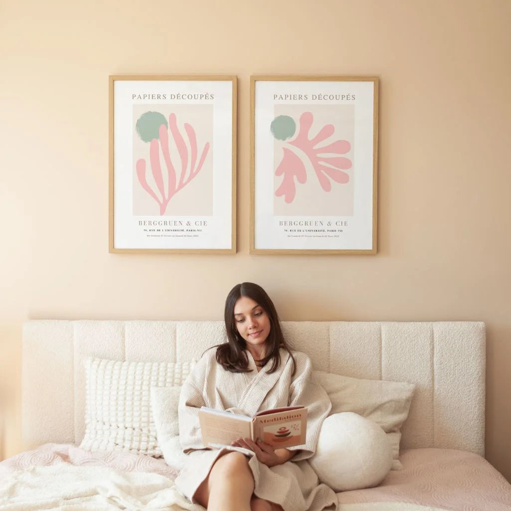 Soft pink abstract poster set styled in modern living room with minimal decor