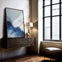 Close up of watercolor landscape poster showing blue gradient layers and mist